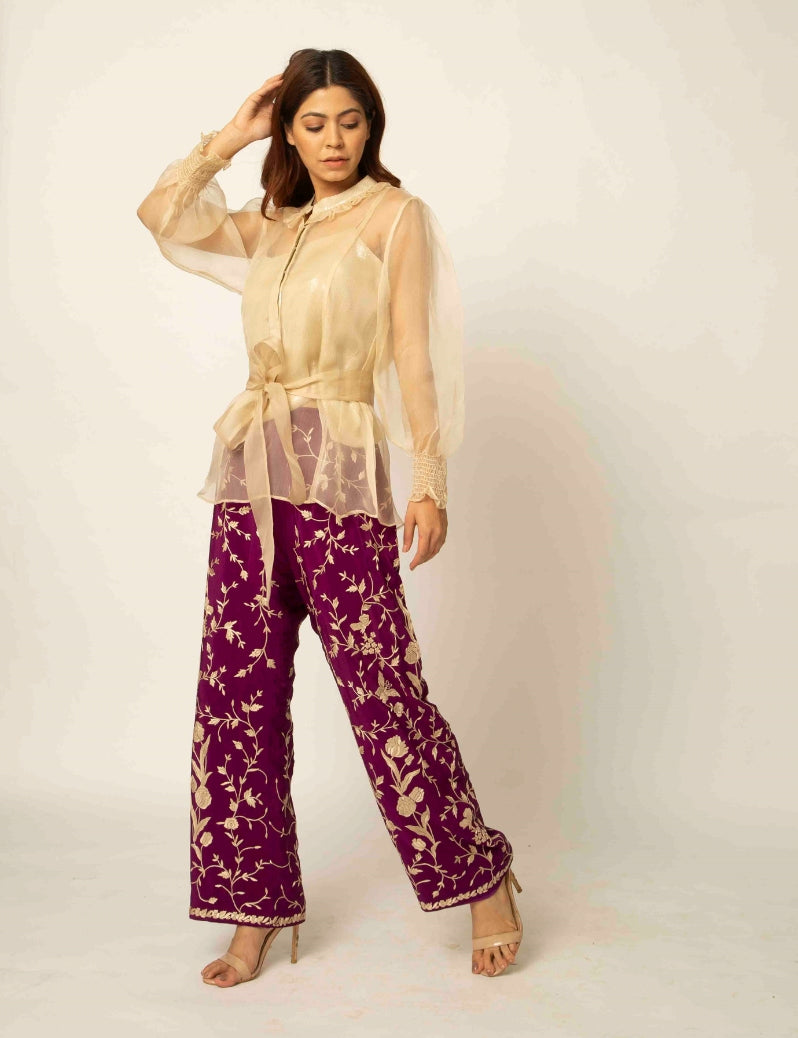 The indo-western Beige colored jacket with purple pants