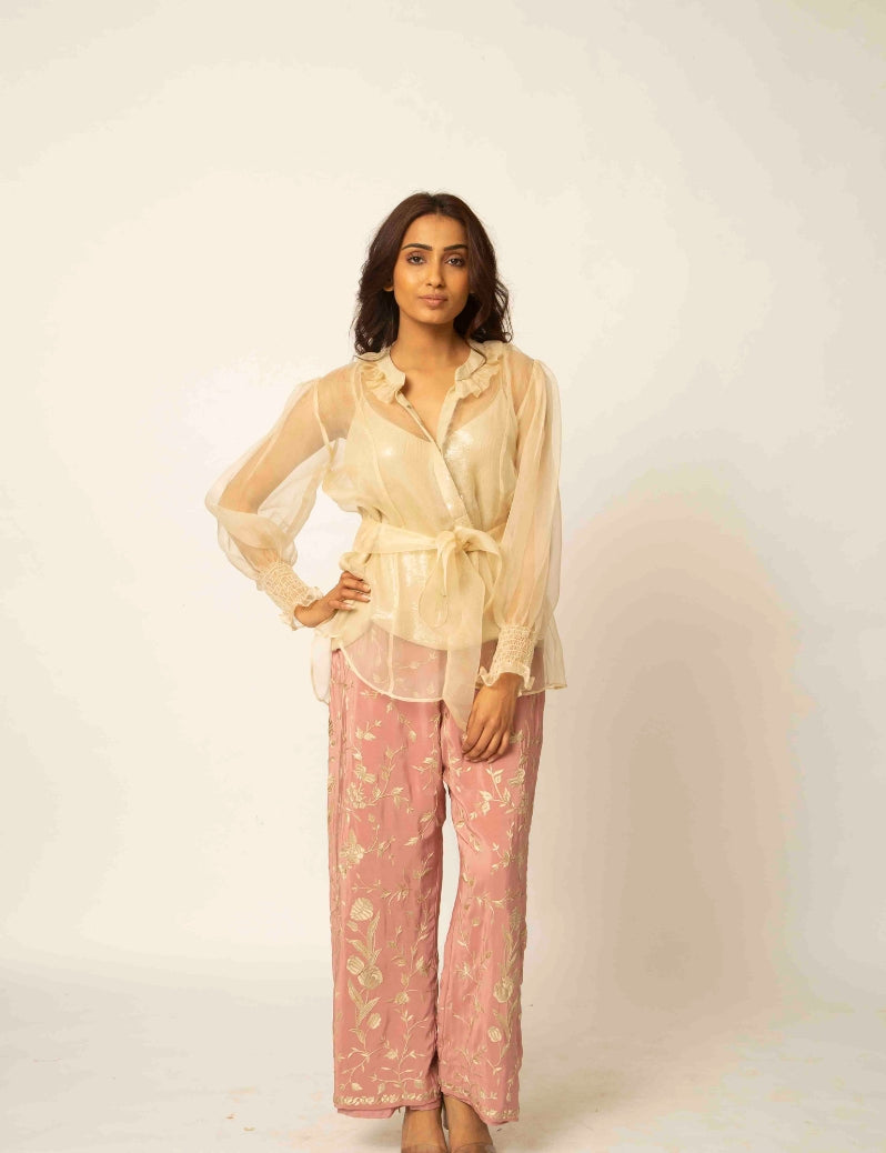 The indo-western Beige colored jacket with pink pants