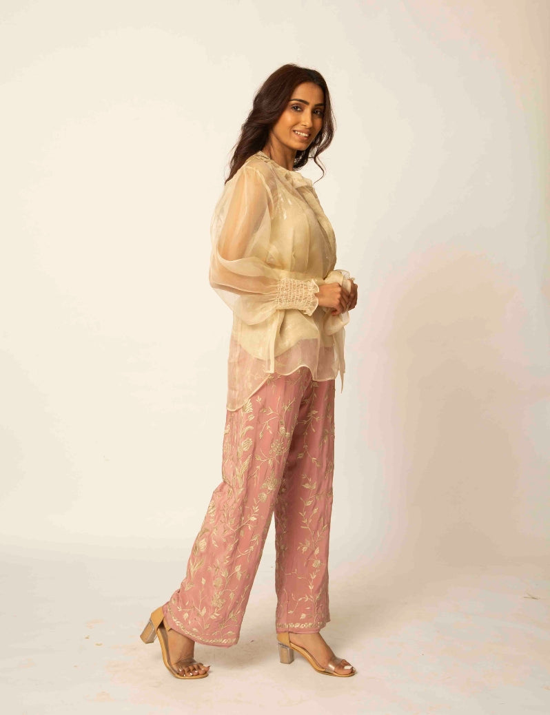 The indo-western Beige colored jacket with pink pants