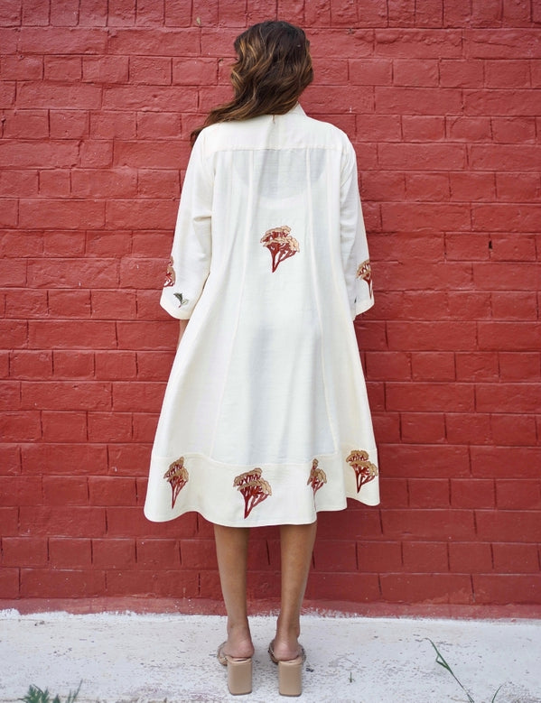 White dress with multi coloured florals