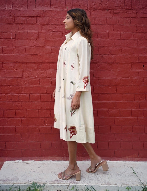 White dress with multi coloured florals