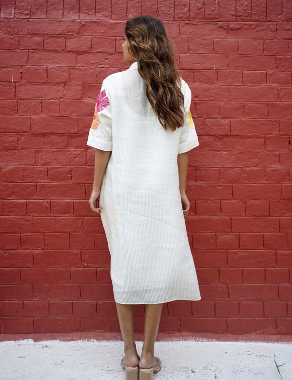 White dress with floral embroidery