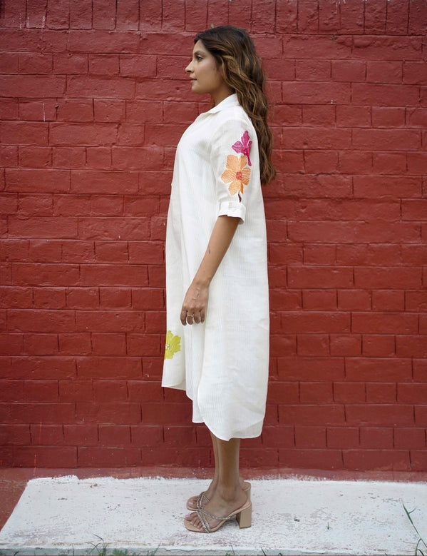 White dress with floral embroidery